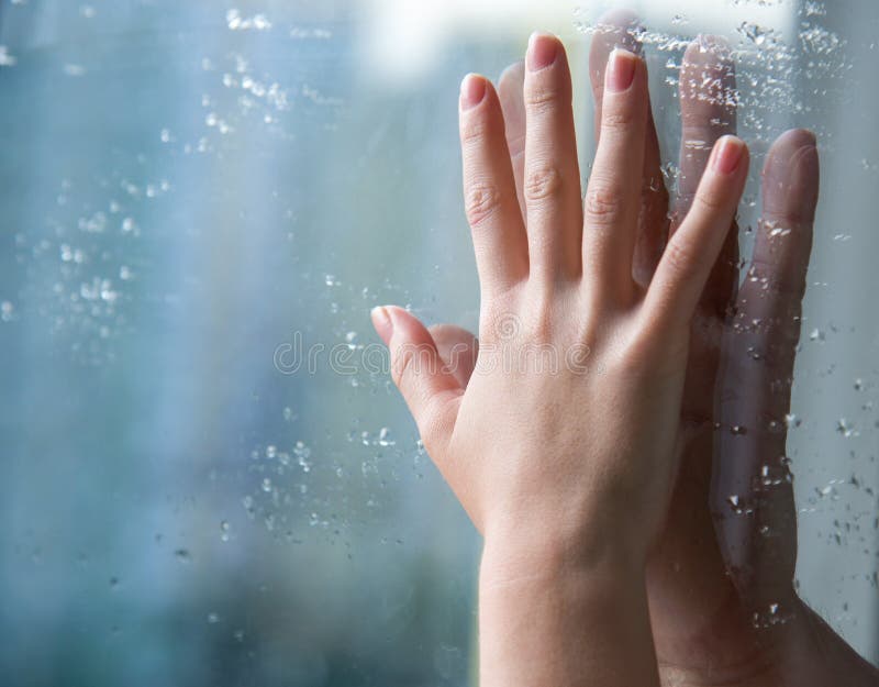 Hands through glass stock photo. Image of friendship 50261796