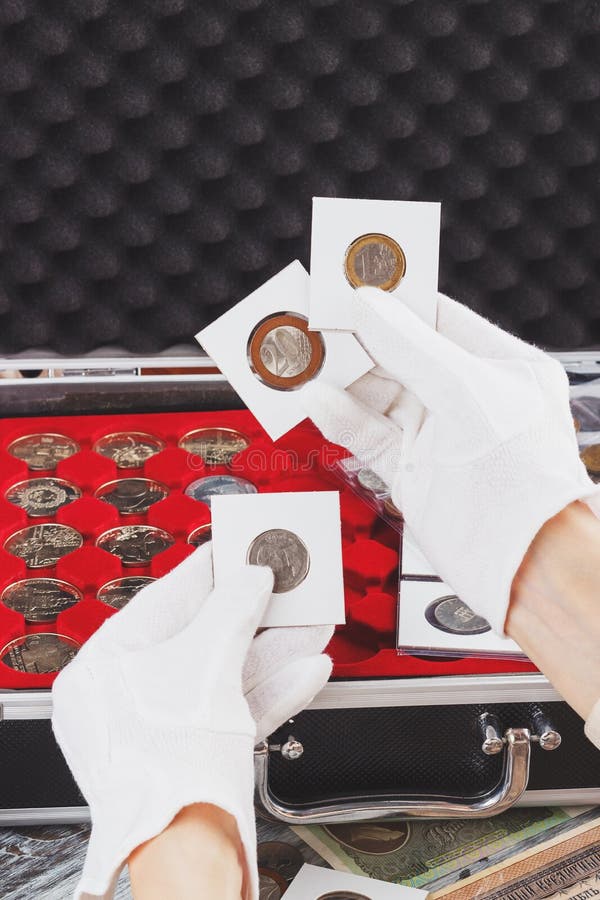 Hands in the Gloves Hold Flips with Collector Coins Stock Image Image