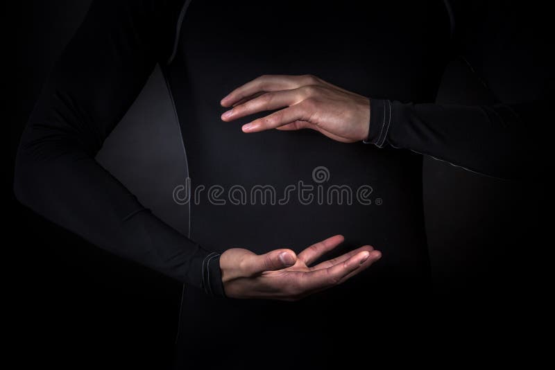 Hands holding abstract glowing object stock image