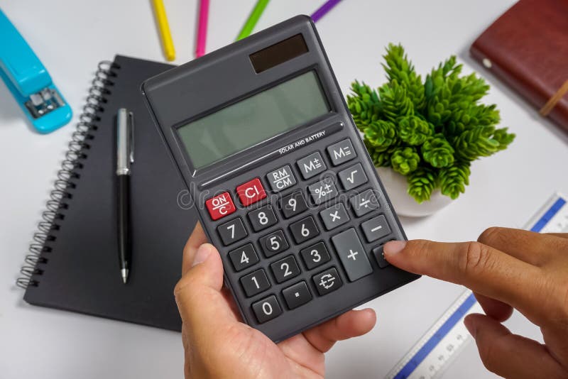 Hands Holding a Calculator. Stock Photo Image of accountant, audit