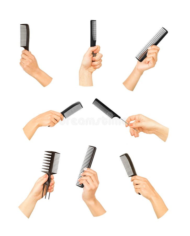 Hands holding combs and brushes stock images