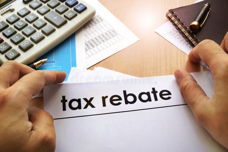 hands-holding-documents-about-tax-rebate-stock-image-image-of-rebate