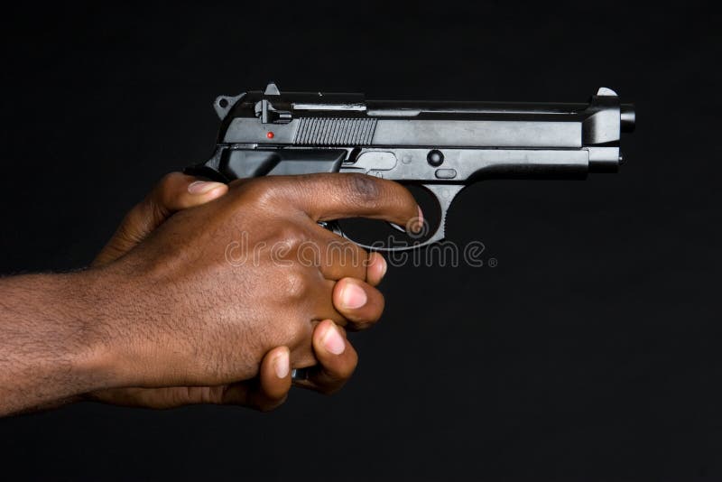 Hands Holding Gun stock image. Image of firearm, trigger 7417713