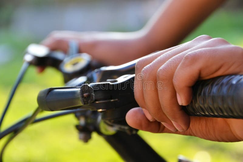 Hands Holding The Handlebars On The Bike Stock Photo Image of extreme