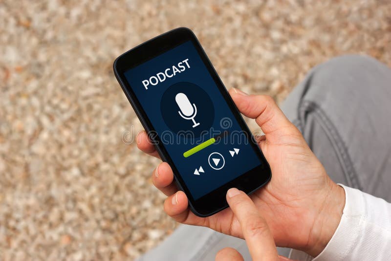 Hands holding smart phone with podcast concept on screen stock image
