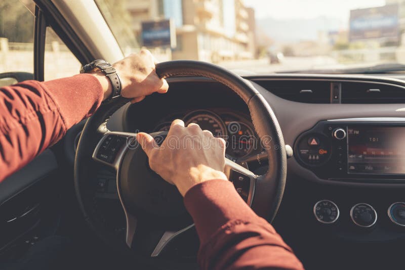 Hands holding steering wheel stock photos Hands holding steering wheel stock photos