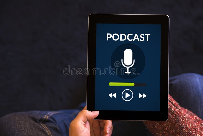 Hands holding tablet with podcast concept on screen stock photography
