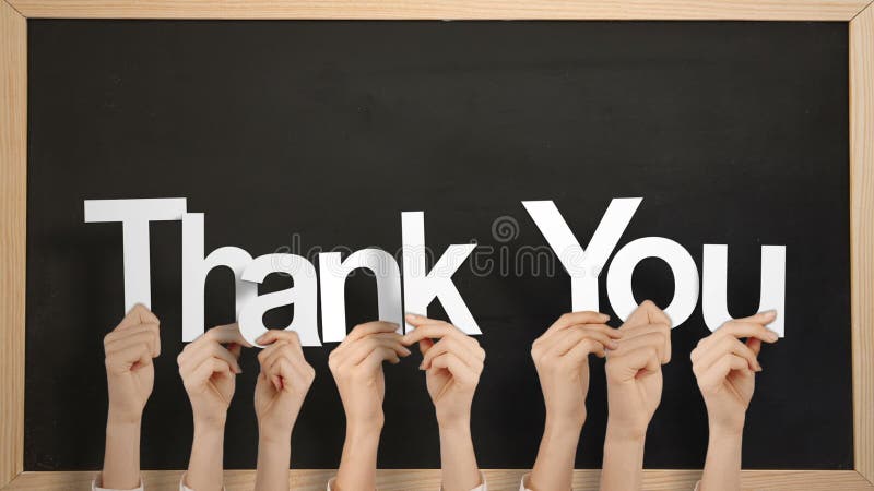 Hands holding up thank you stock footage