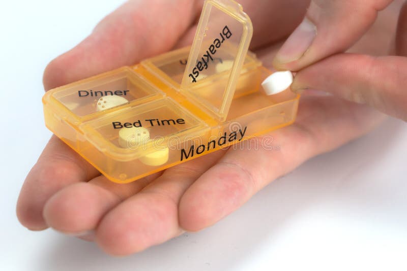 Hands of Human with Pill Reminder Box, Taking Medication on White