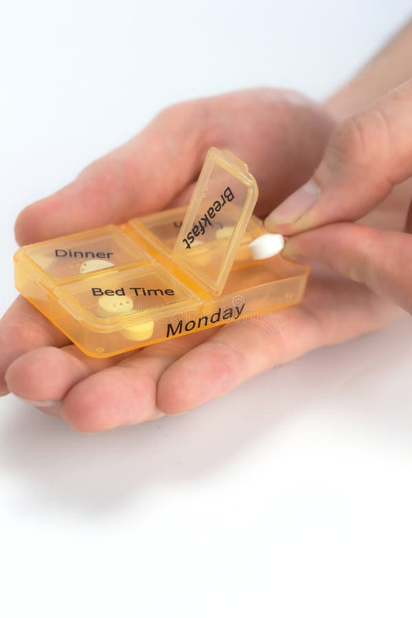 Hands of Human with Pill Reminder Box, Taking Medication on White