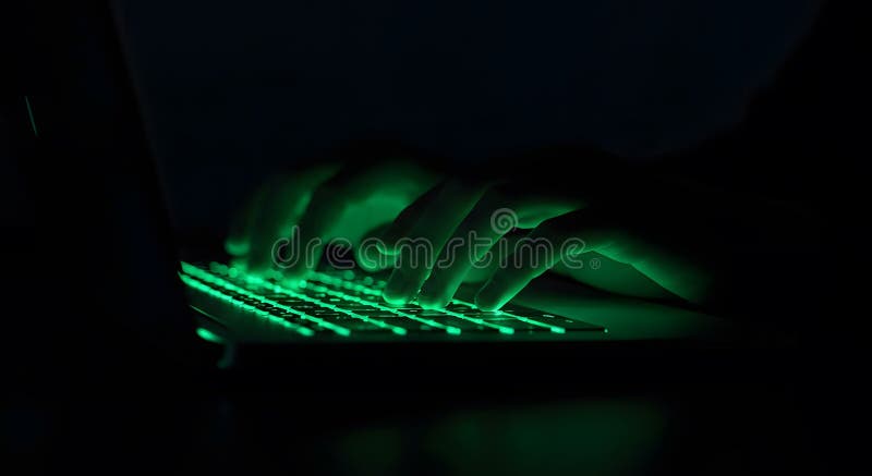 Hands illuminated green typing on keyboard dark room evocative cyberpunk aesthetic, concept hacking or coding intense focus and concentration. Represents digital world's intersection humanity technology, intriguing visual for technology blogs or articles security. Captures essence of innovation. This content is generated by AI. Coding text hacker concept stock images, royalty-free photos and pictures