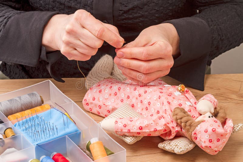 Hands Inserting Thread a Needle Stock Photo Image of work, coil 67659328