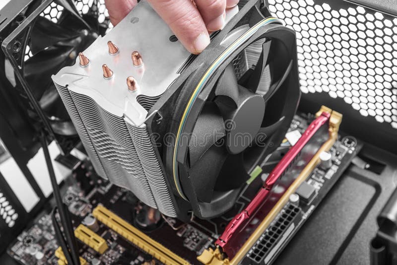 Hands Installing a Fan on the Motherboard Stock Photo Image of