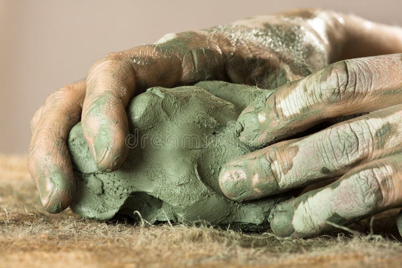 Human hands knead clay stock photo. Image of artist, human 71373104