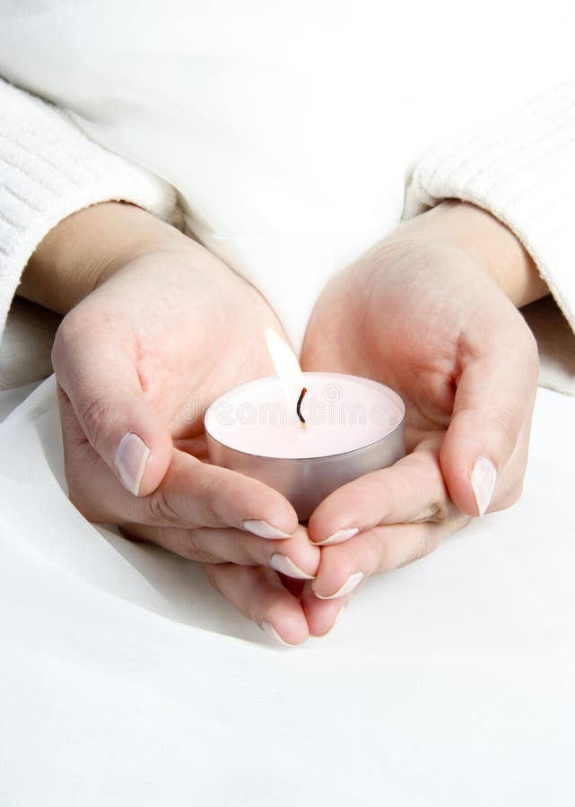 Candle in hands stock image. Image of light, contemplation 10310297
