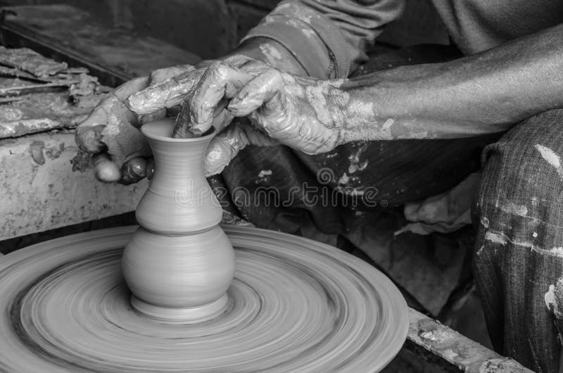 Hands of Making Clay Pot on the Pottery Wheel ,select Focus, Closeup