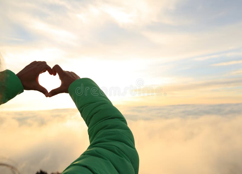 Hands Making a Heart Shape on Sunrise Mountain Stock Image Image of woman, freedom 64211815