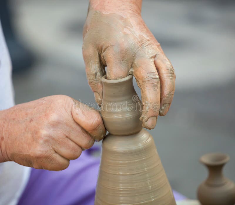 Hands Making Pottery on a Wheel Stock Image Image of molded, rotating