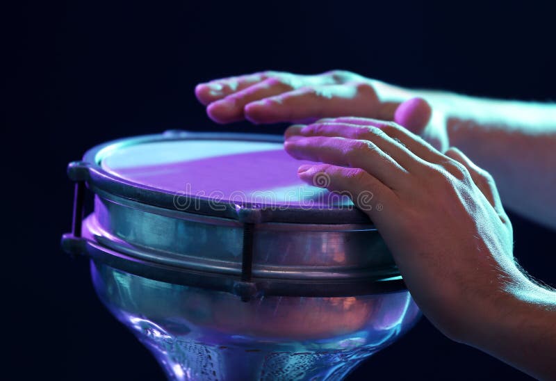 Hands of man playing African drum royalty free stock photo Hands of man playing African drum royalty free stock photo