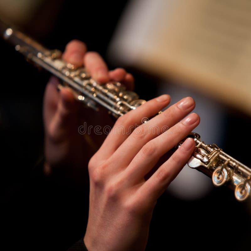 Hands of Man Playing a Flute Stock Photo Image of entertainment