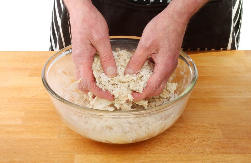 Hands kneading bread dough stock image. Image of worktop 30314763