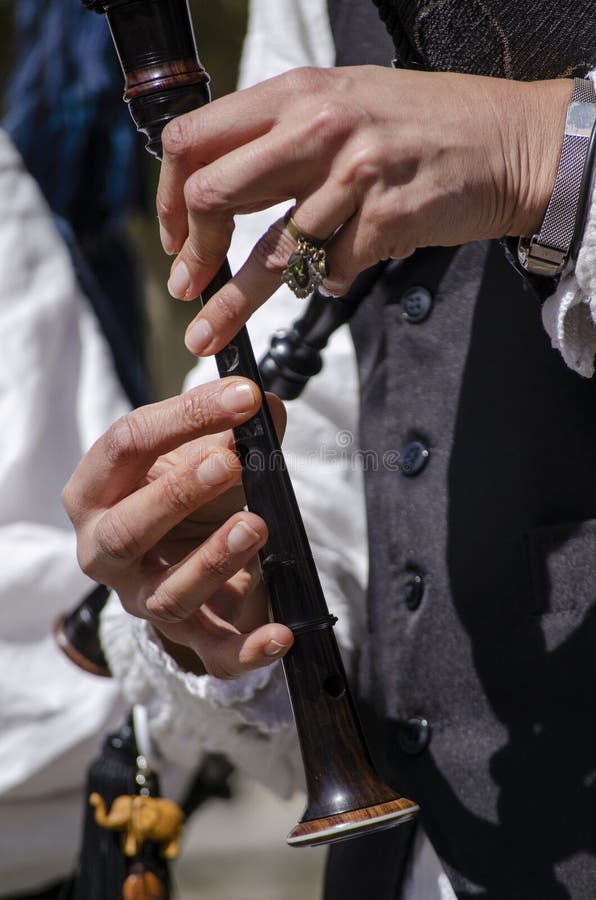 Hands of a Musician Playing a Bagpipe. Galicia, Spain Stock Image