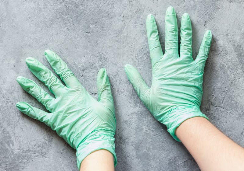 Hands in Nitrile Green Gloves on a Concrete Surface Stock Photo Image of female, hands 162519106