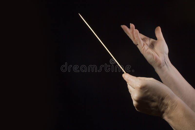 Hands of an orchestra conductor