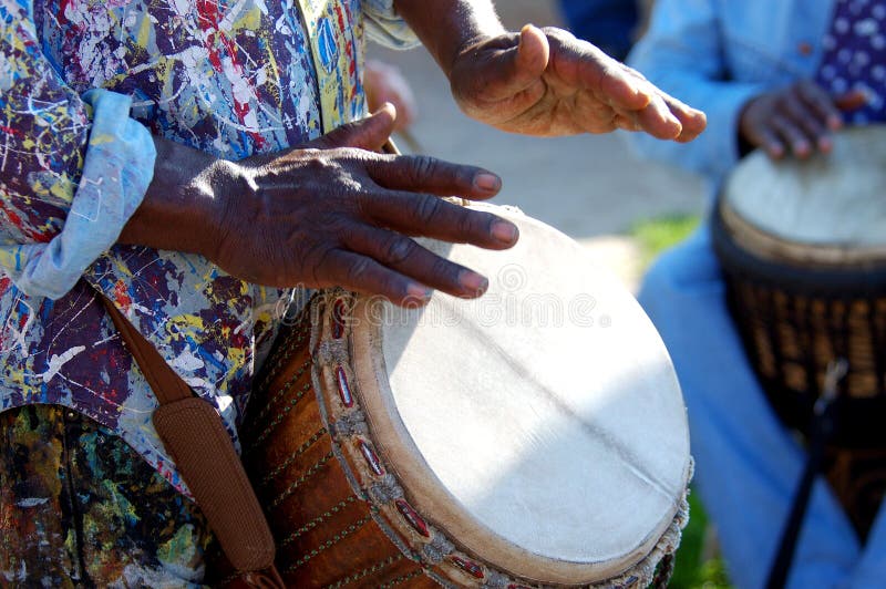 Close up look at the hands of a street performing drummer. Close up look at the hands of a street performing drummer