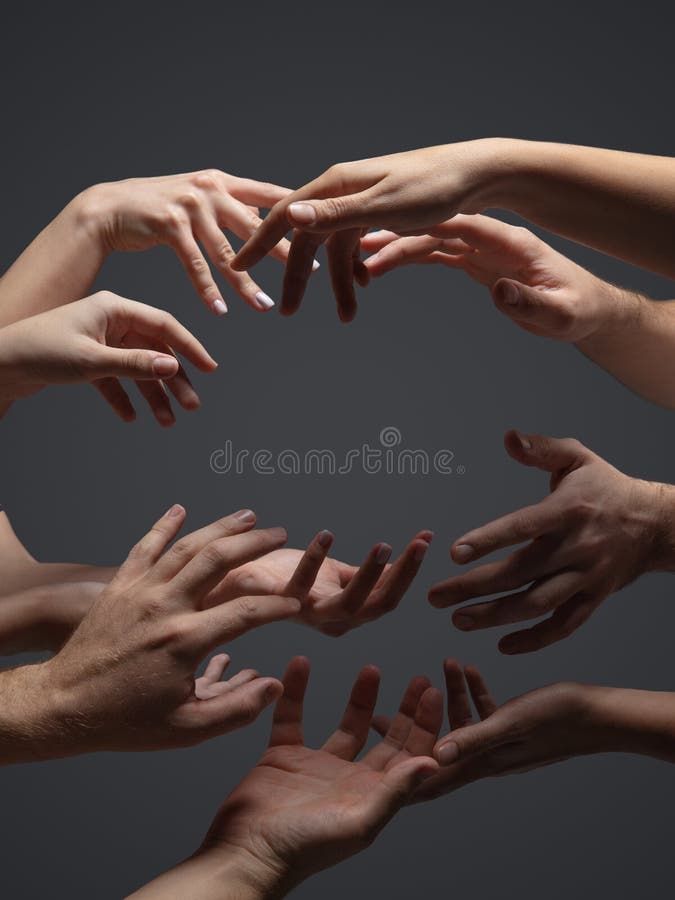 Hands of People`s Crowd in Touch on Grey Studio Background. Concept of ...