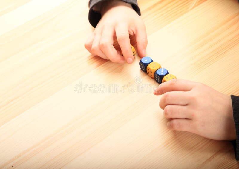 Hands playing with dice stock image. Image of hold, playing 50834197