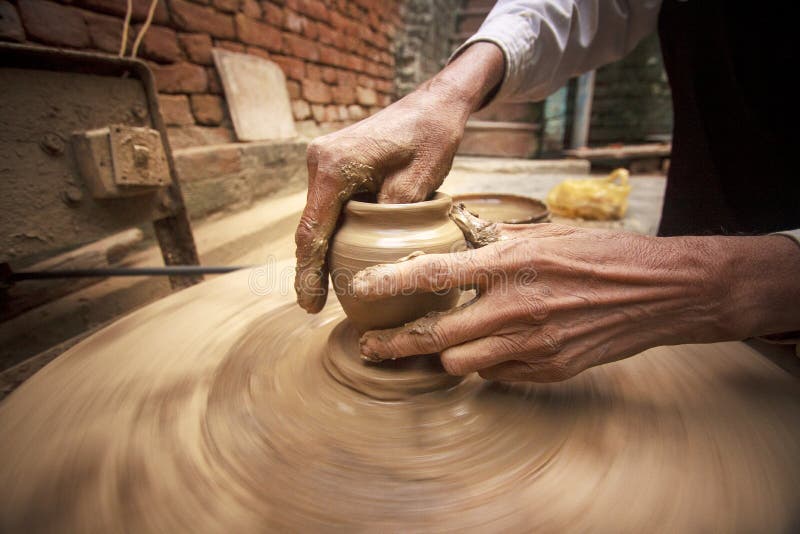 Hands of a potter.