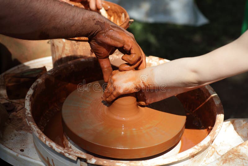 Hands of Potters on a Wheel Stock Image Image of adjusting, abstract