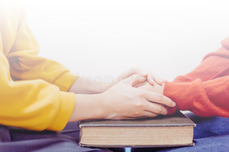Hands woman pray together on bible with copy space. Hands woman pray together on bible with copy space.