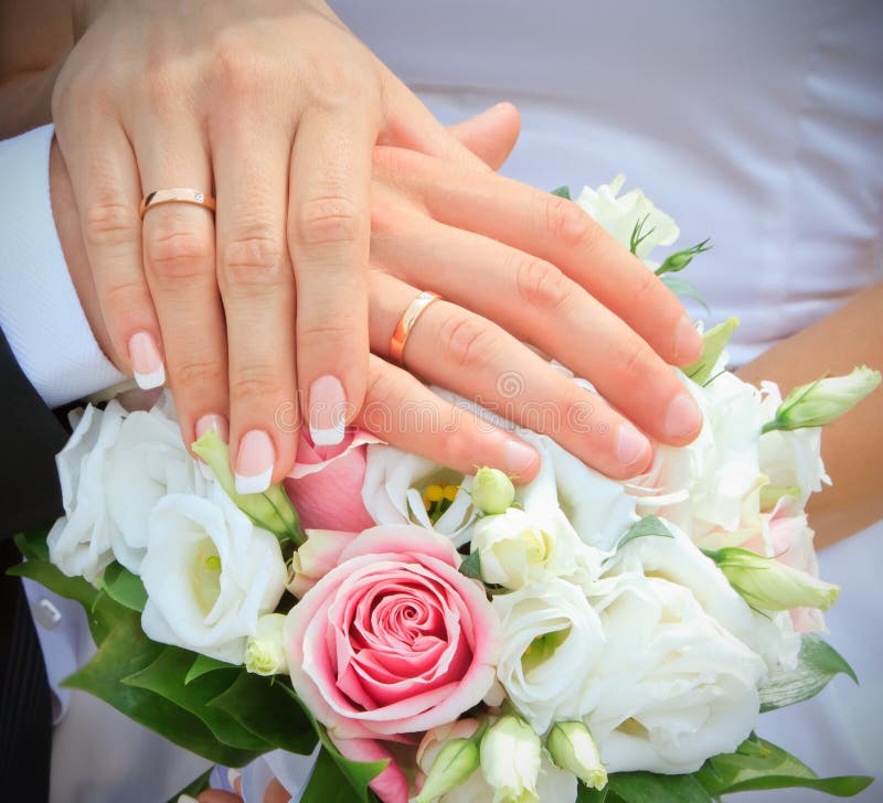 Hands and rings on wedding