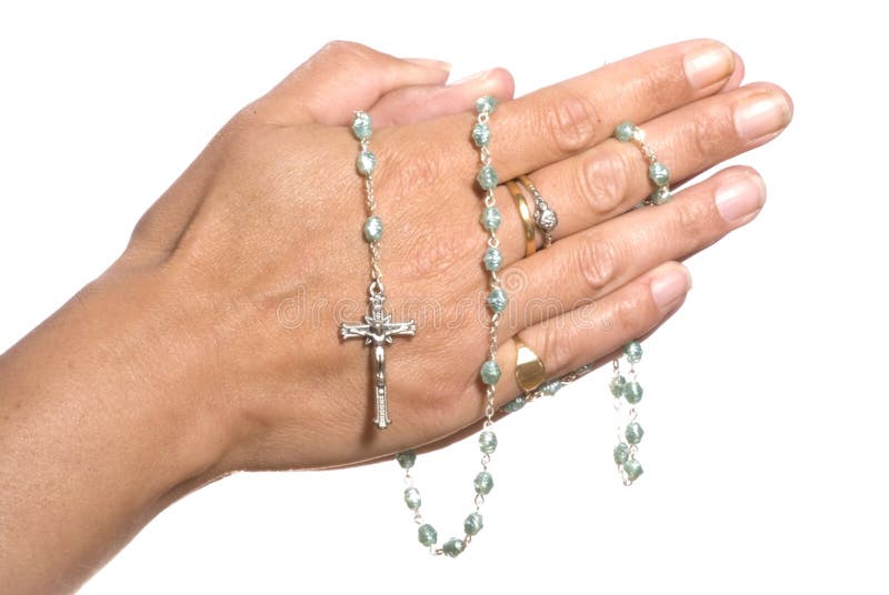 Hands praying, holding blue rosary beads isolated on white background. Hands praying, holding blue rosary beads isolated on white background