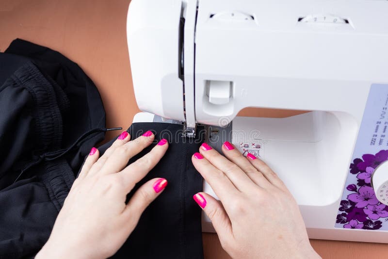 Hands on the Sewing Machine Stock Image Image of clothes, domestic
