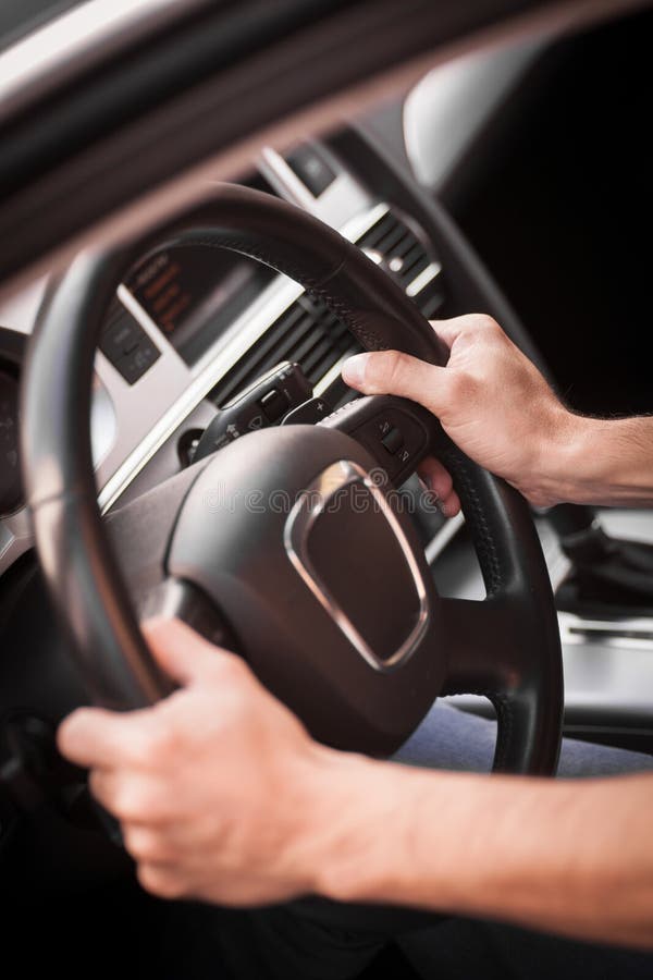 Hands on steering wheel stock photo. Image of dashboard 70832826