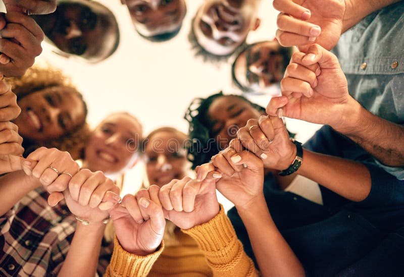 Hands of Strength and Support. Low Angle Shot of a Group of People