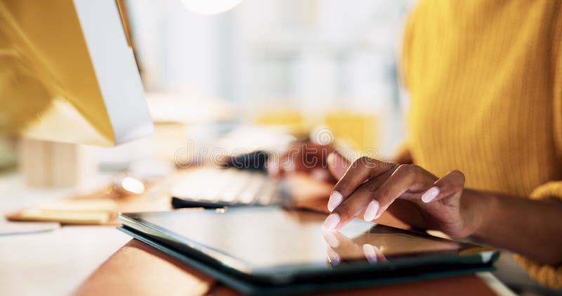 Hands, tablet and computer for creative, research or editing newsletter at office desk. Person, writer or editor with desktop keyboard for copywriting website, social media or email for news business. Computer editing stock images, royalty-free photos and pictures