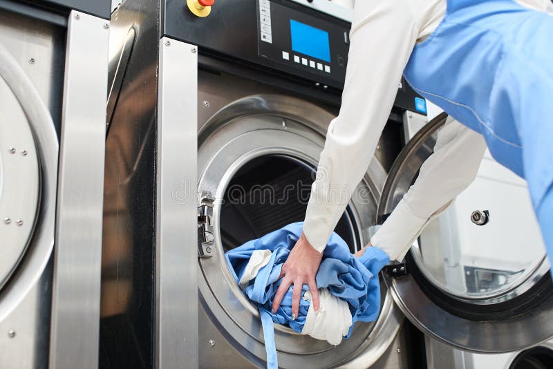 Hands To Load the Laundry in the Washing Machine Stock Image Image of
