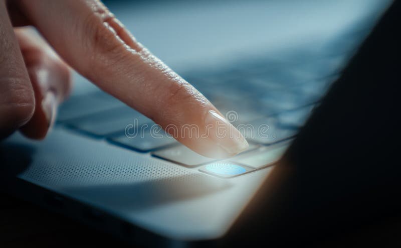 Hands touch fingerprint on the laptop screen scanner to access personal user online. Fingerprint macro stock images, royalty-free photos and pictures