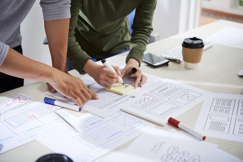 UX designers working on website wireframe design royalty free stock photo UX designers working on website wireframe design royalty free stock photo