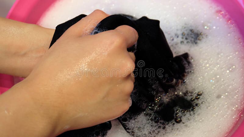Woman Wash Hands Dirty Clothes In The Basin Black For Cleansing,Thailand Washing  Clothes Style Ancient And Soak With Detergent In The Evening. Stock Photo,  Picture and Royalty Free Image. Image 72016819.