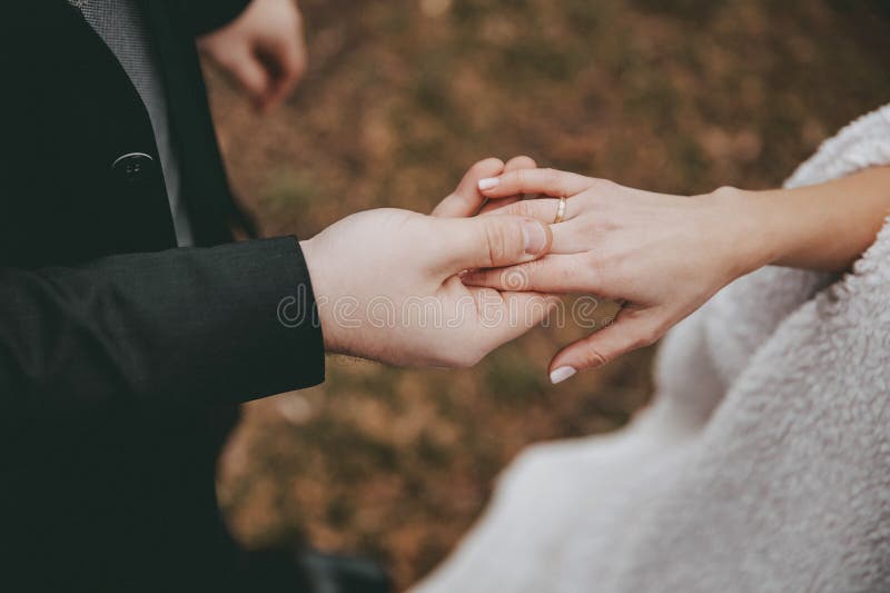 Hands of Wedding Couple with Ring Stock Image Image of male, human