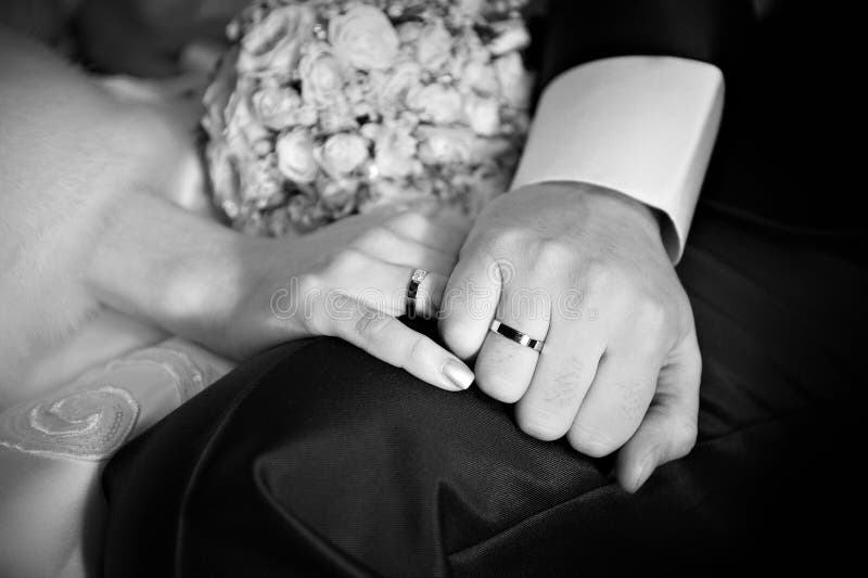 Hands with wedding gold rings