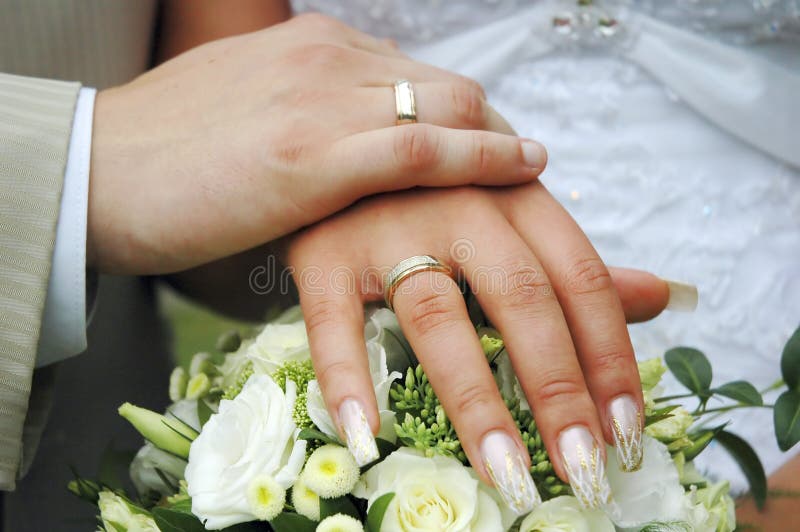 Hands with wedding rings royalty free stock photos