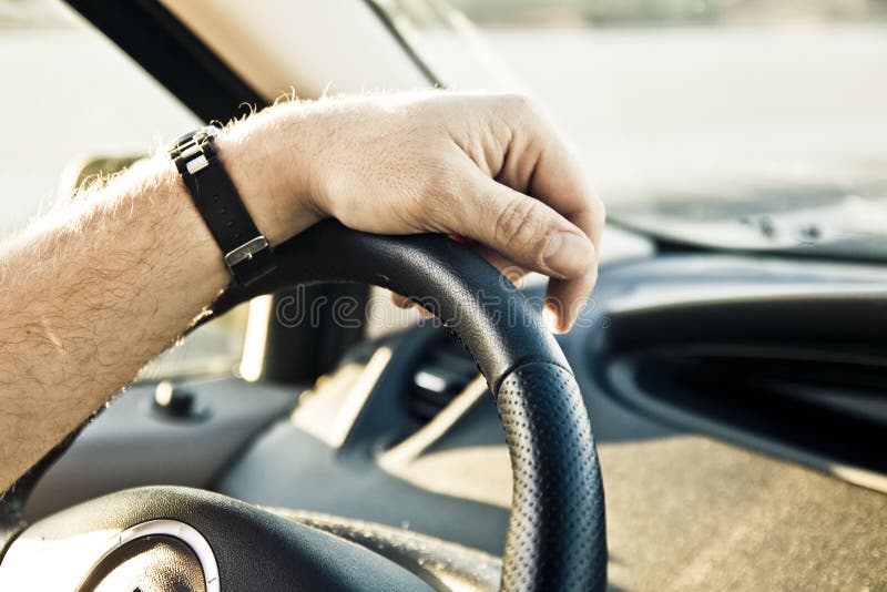 Hands on wheel stock photo. Image of safety, hour, hand 4741748