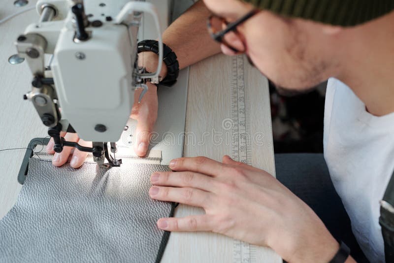 Hands of Young Leatherworker Sewing Zipper and Piece of Leather Together Stock Image Image of