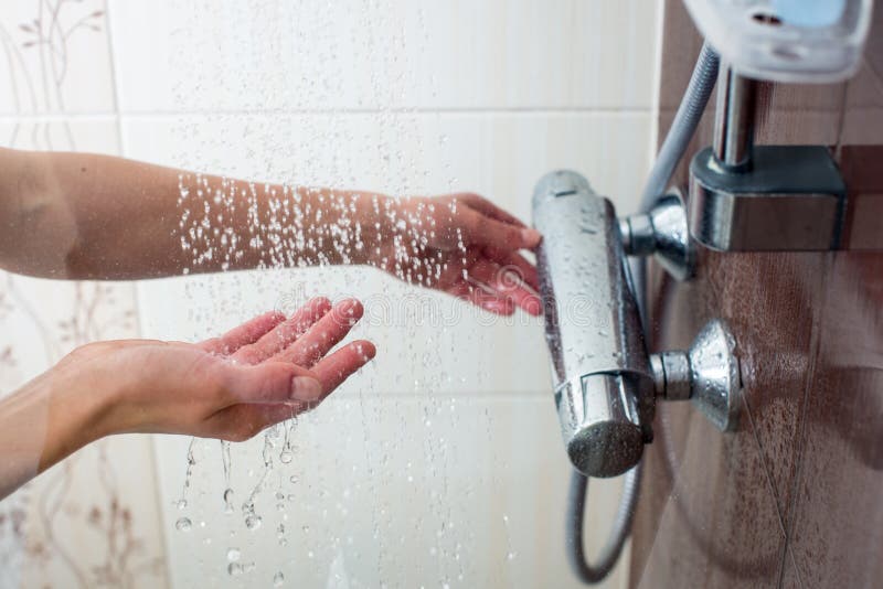 Hands of a Young Woman Taking a Hot Shower Stock Image Image of drops